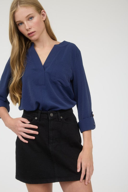 Blusa manga 3/4 con cuello redondo con abertura