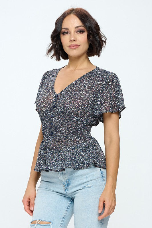 Blusa nido de abeja manga corta estampada