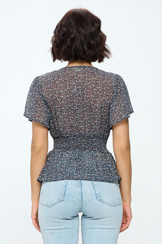 Blusa nido de abeja manga corta estampada