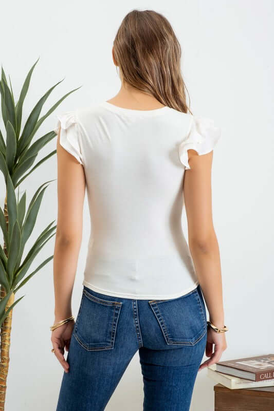 Blusa de punto en mangas voladas