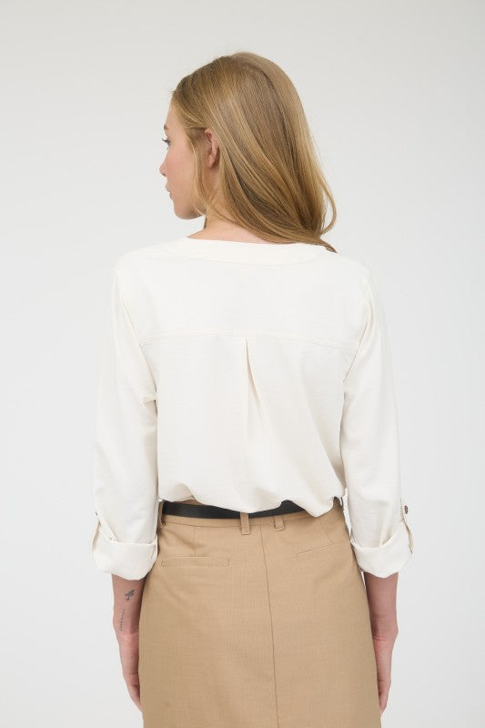 Blusa manga 3/4 con cuello redondo con abertura