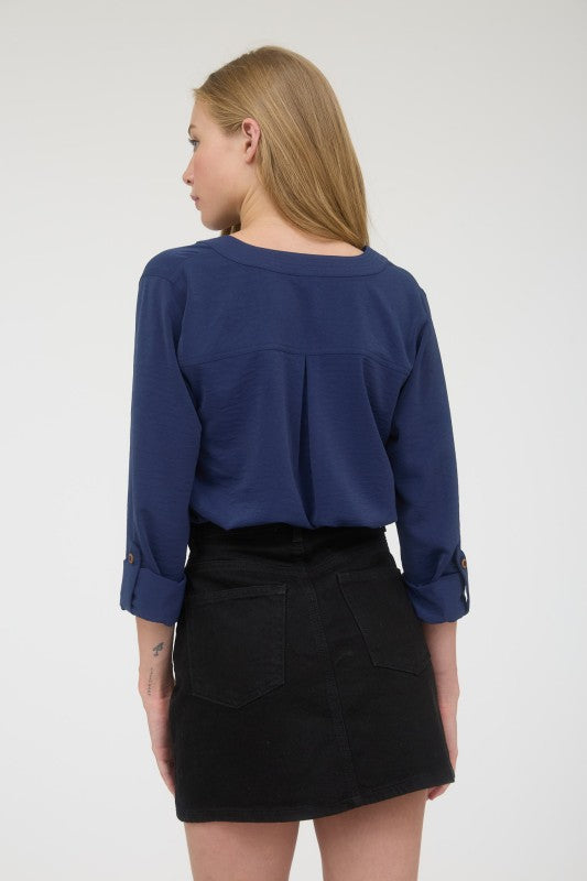 Blusa manga 3/4 con cuello redondo con abertura